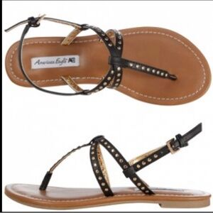 American eagle black strapy studded faux leather buckle strap sandals 9.5​